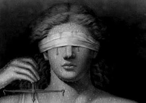Justiça cega… Ou a cegueira da justiça?